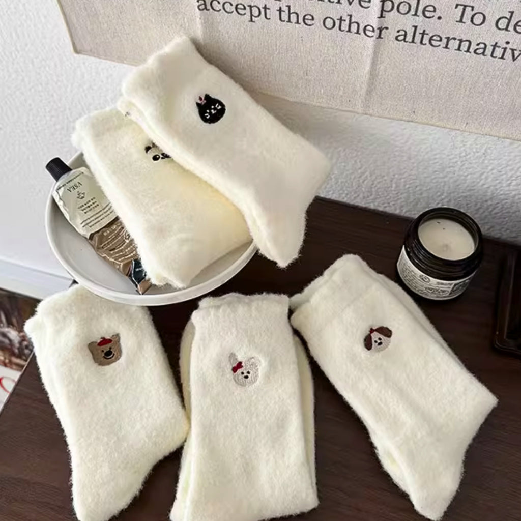 Chaque paire est décorée d’une petite tête d’animal brodée très mignonne🐶