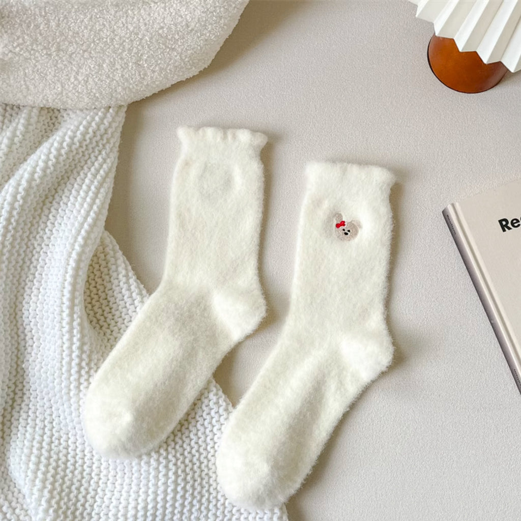 Chaque paire est décorée d’une petite tête d’animal brodée très mignonne🐶