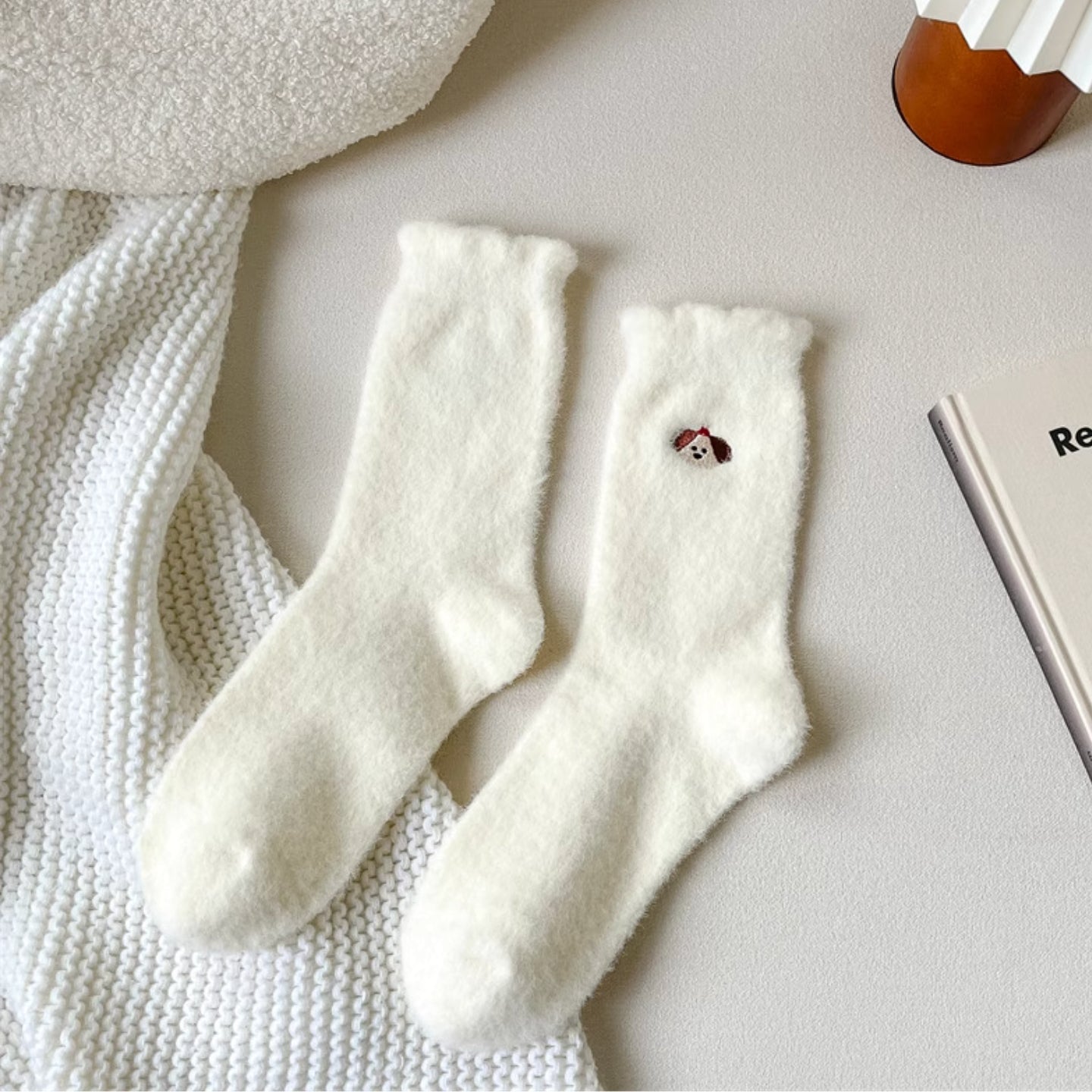 Chaque paire est décorée d’une petite tête d’animal brodée très mignonne🐶